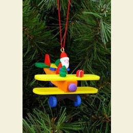 Santa Claus on plane - 6,8 / 4,8cm - 12 pcs. / 3 x 2 inch